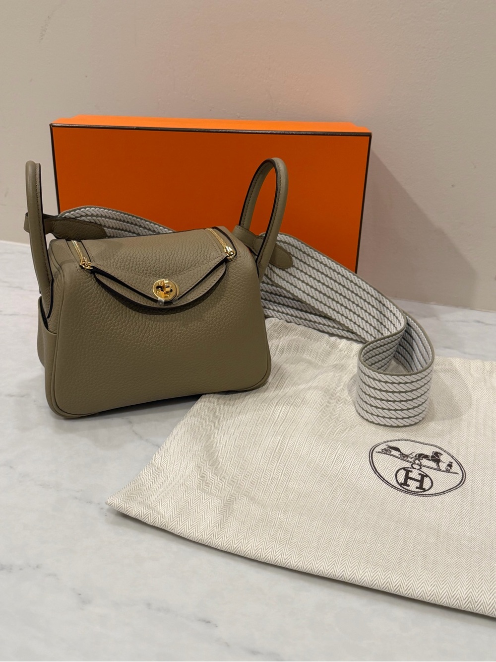 NEW 2026 Mini Lindy 20 Gris Meyer with seasonal strap in Clemence leather